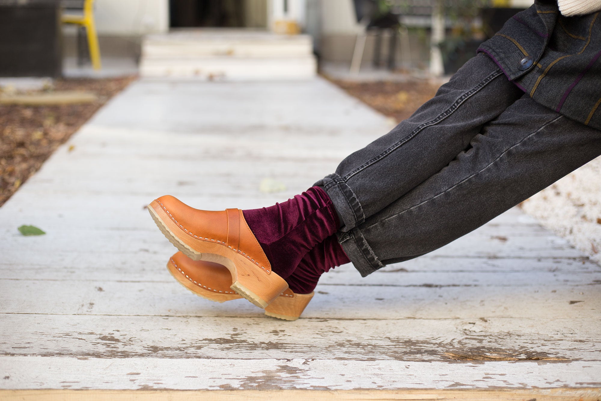 Berkeley clogs in cognac pull up leather on a natural wooden bottom